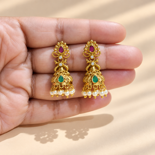 Rosamund multicolour Kemp mini jhumka earrings gold finish pink green stones pearl drops shown in hand