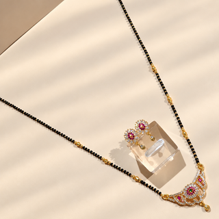 Olivia black bead mangalsutra necklace set angled flat lay