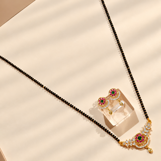 Amelia CZ diamond floral mangalsutra necklace and earrings angled flat lay