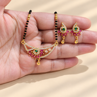 Phoebe multicolour artificial diamond mangalsutra and earrings shown in hand