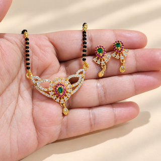 Charlotte green pink white stone mangalsutra necklace set held in hand detail