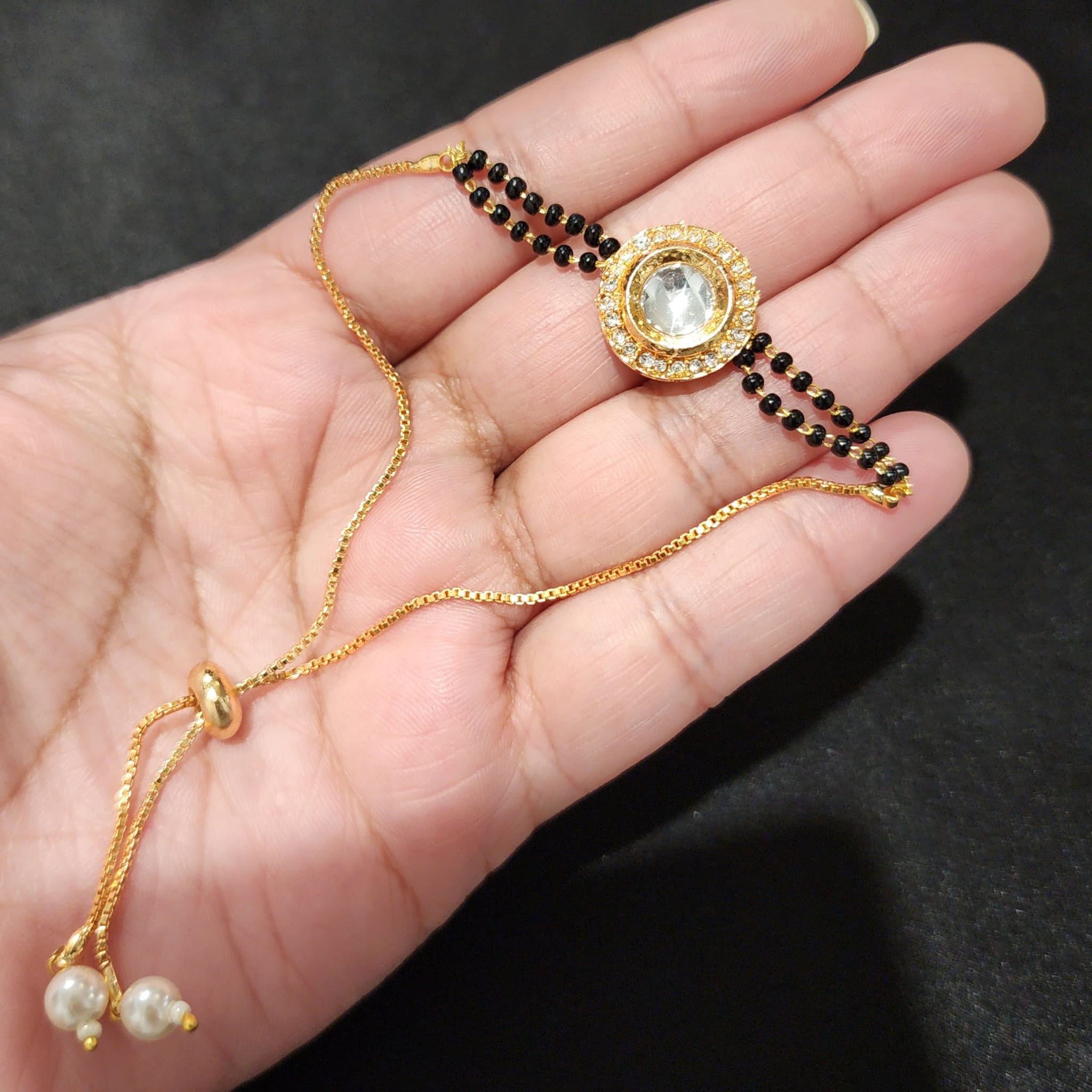 Saba Adjustable Mangalsutra Bracelet | Mangalsutra bracelet, Black beaded  jewelry, Gold mangalsutra designs