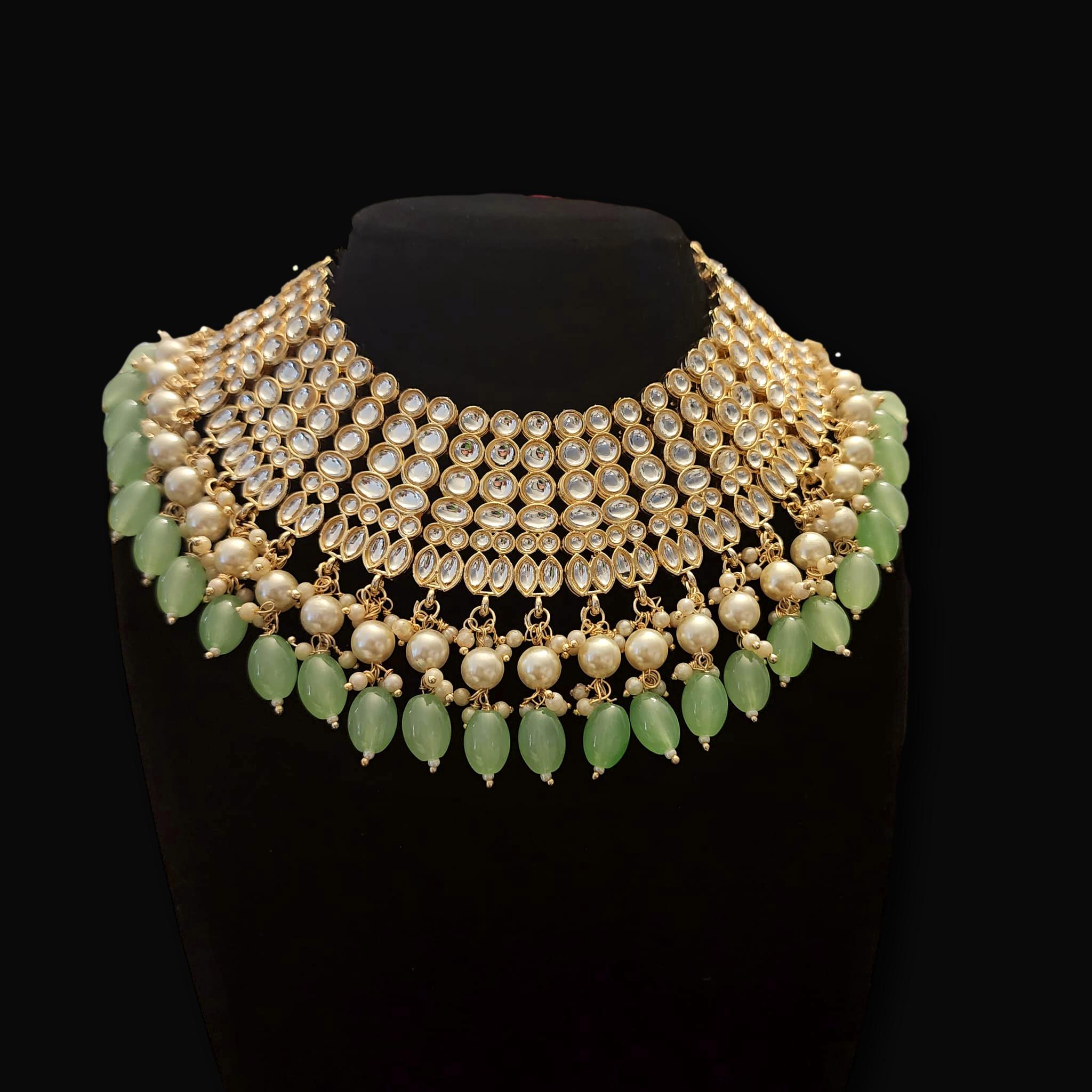 Green hot sale kundan jewellery