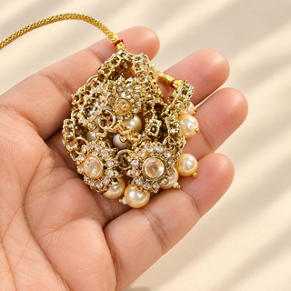 Aavika Polki gold choker necklace set with ivory pearl drops, earrings and maang tikka - view 2