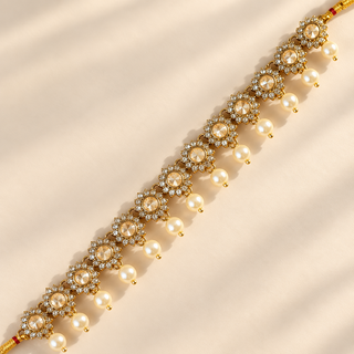 Aavika Polki gold choker necklace set with ivory pearl drops, earrings and maang tikka - view 4