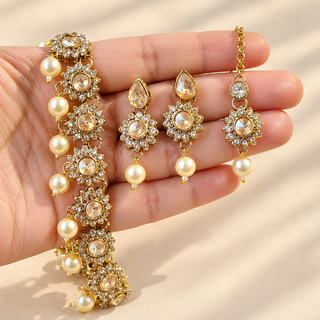 Aavika Polki gold choker necklace set with ivory pearl drops, earrings and maang tikka - view 5