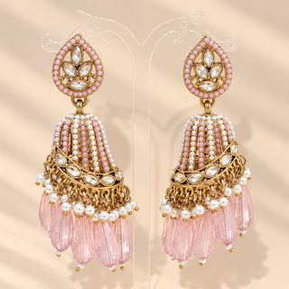 Adeline light pink blush polki jhumka earrings with gold finish, white pearl accents and translucent pink bead drops on stand