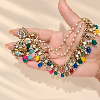 Adeline multicolour mirror baahubali jhumka earrings held in hand showing colourful bead drops and decorative ear chains