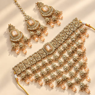 Araminta gold finish polki bridal choker necklace set champagne peach stone details with 9.5 cm matching earrings and maang tikka photo 1