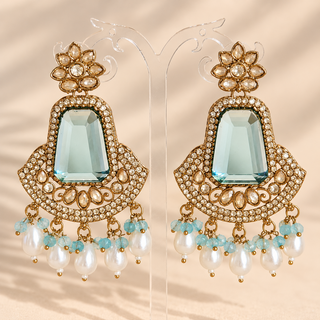 Beatrix light blue polki gold finish earrings with translucent aqua blue stones and white pearl drops