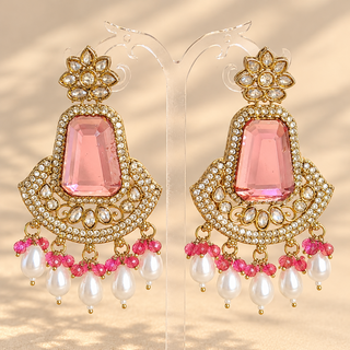 Beatrix pink polki gold finish earrings with faceted pink stones and white pearl drops front view