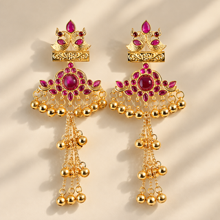 Claudine purple magenta Kashmiri earrings gold finish with peacock-inspired motifs and dangling ghungroo bells on beige background