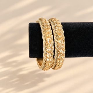 Cressida gold imitation kada bangles set of two on jewellery stand close up