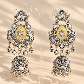 Cressida yellow German silver oxidised kundan jhumka earrings 8.5 cm with yellow teardrop stones and ghungroo bells on display stand