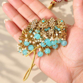 Dovey pastel blue polki necklace close up gold finish blue bead drops and white stone floral detailing