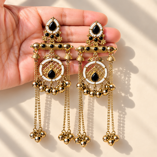 Eldora black Kashmiri chandelier earrings with long ghungroo chains held in hand