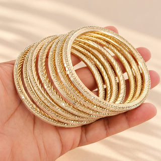 Euphrasia set of eight gold finish slim Indian artificial stacking bangles with pearly white reflective accents crystal-look sparkle photo 5