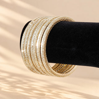 Euphrasia set of eight gold finish slim Indian artificial stacking bangles with pearly white reflective accents crystal-look sparkle photo 6