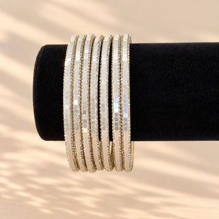 Euphrasia silver finish Indian bangle set of 8 on black jewellery stand front view