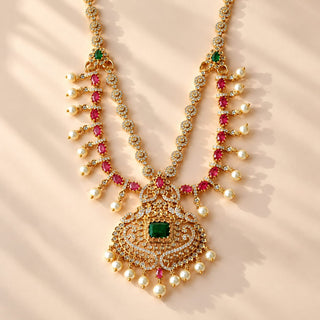 Evangeline multicolour CZ diamond simulant gold finish Indian necklace set green and rani pink stones white pearl drops matching 4 cm earrings photo 3