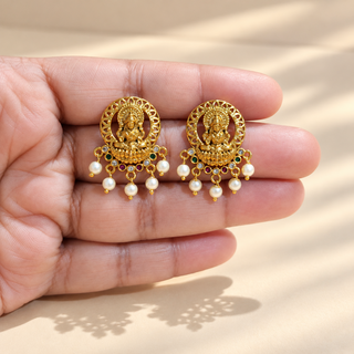 Winifred multicolour Indian imitation Kemp temple stud earrings shown in hand size reference