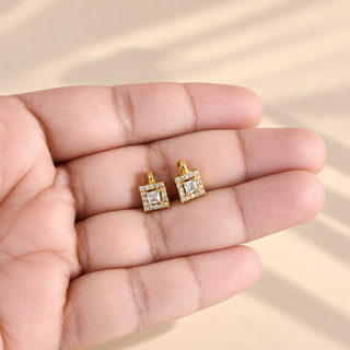 Georgina gold square CZ diamond ear cuff earrings in hand