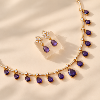 Imogen purple pear drop cubic zirconia Indian imitation necklace set with matching earrings closeup
