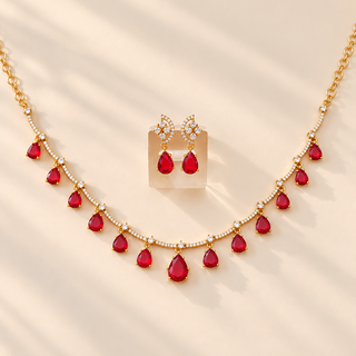 Imogen red CZ diamond necklace set gold finish with white cubic zirconia and red teardrop stones