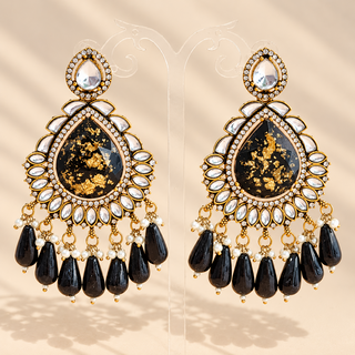 Lavinia black kundan chandelier earrings 9 cm with gold fleck teardrop centres and black bead drops on display
