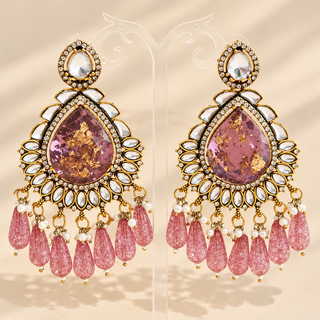 Lavinia purple mauve kundan statement earrings 9 cm with gold fleck teardrop stones and pink bead tassels on display stand
