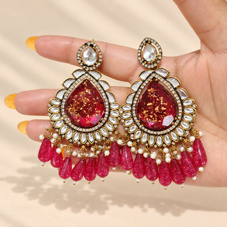 Lavinia rani pink kundan statement earrings 9 cm on transparent display with pink teardrop centres and bead drops