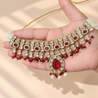 Mabel red kundan necklace with pearl strands and ruby red teardrop pendant close-up