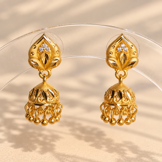 Marigold gold CZ diamond mini jhumka earrings 2 cm pointed leaf studs on stand