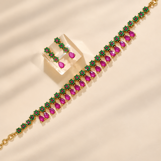 Marigold green and rani pink CZ-style necklace with teardrop pink stones, gold finish