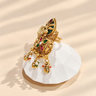 Millicent multicolour traditional Indian Kemp statement ring gold finish, green enamel, red and green stones and pearl-like dangling charms, photograph 1