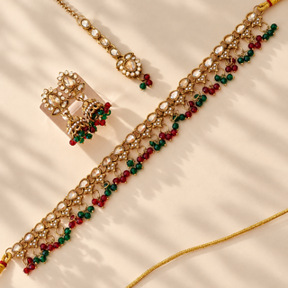 Raya multicolour red green polki Indian imitation necklace set with matching earrings and maang tikka full view
