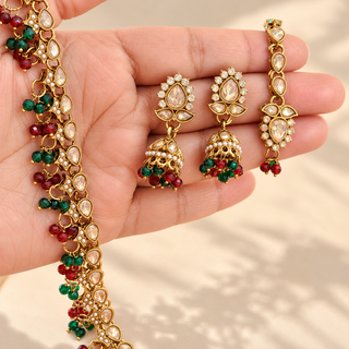 Raya red and green polki necklace set detailed close-up of 4.4 cm jhumka earrings maang tikka and bead fringe