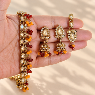 Raya red and orange polki necklace set close up matching 4.4 cm jhumka earrings and maang tikka
