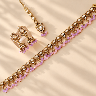 Raya pastel pink and lavender purple polki necklace set gold finish with matching jhumka earrings and maang tikka