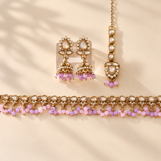 Raya pastel pink and purple Indian imitation polki necklace set close-up of matching 4.4 cm jhumka earrings and maang tikka