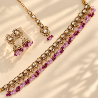 Raya purple polki necklace set in gold finish with dark purple and light purple bead drops and matching jhumka earrings