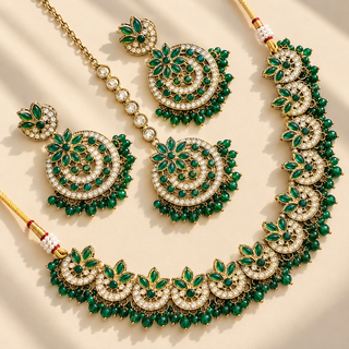 Rosamund emerald green kundan necklace set with chandbali earrings and matching maang tikka gold finish