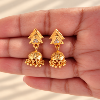 Winifred 2 cm gold mini jhumki earrings with cubic zirconia style stones photographed in hand