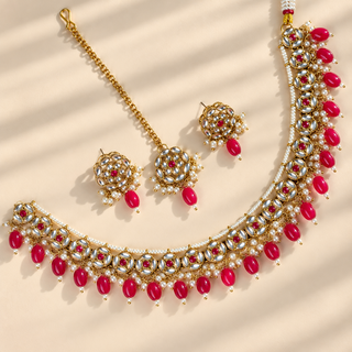 Winifred hot pink kundan Indian necklace set with pearl bead clusters and matching earrings maang tikka