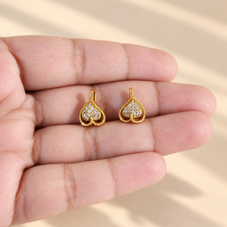 Winona gold heart shaped diamond simulant bugadi ear cuffs shown on hand